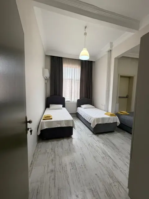 Tek kişilik yataklarıyla oda