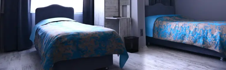 İki tek kişilik yataklı oda